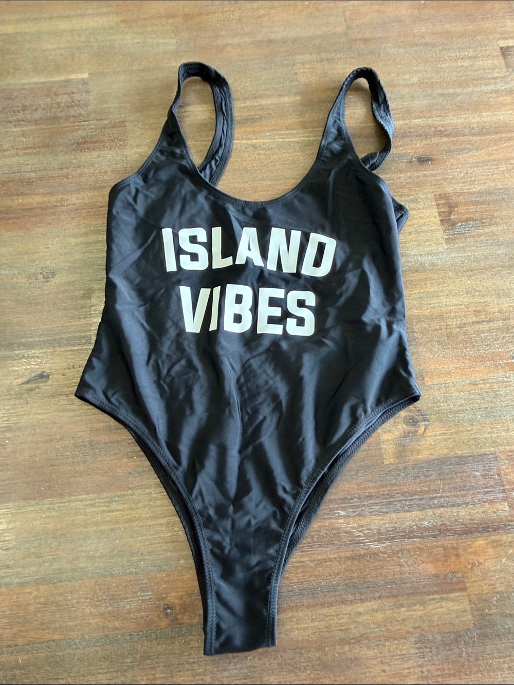 Black One-Piece Swimsuit with White 'ISLAND VIBES' Print